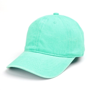 Detail view of mint green washed cotton baseball cap with six-panel structure and eyelets