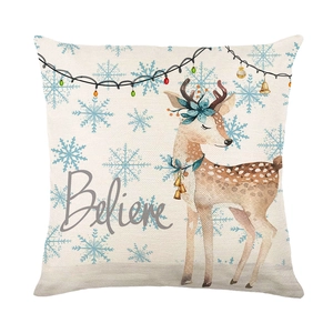Christmas reindeer pillow cover with Believe typography and festive light pattern