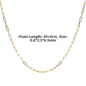 Detail view of gold paperclip chain necklace with measurements 45+5cm length and link size