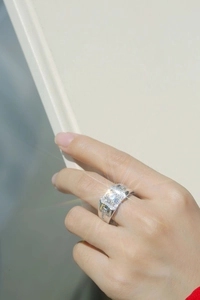 Close-up of luxury 925 silver men's ring featuring a large square-cut moissanite stone