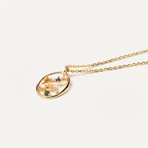 Detail of s925 silver necklace with oval gold pendant and colorful zodiac crystals
