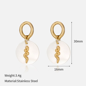Detail of gold snake earrings with white shell pendant showing 30mm height and 16mm diameter