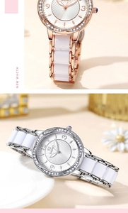 Detail of elegant quartz watch featuring a crystal bezel and white ceramic strap link