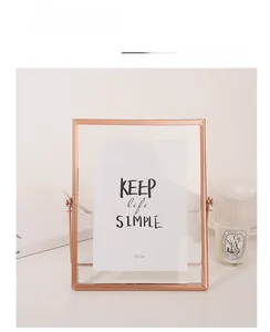 Detail of 5x7 inch rose gold metal frame with minimalist double-sided glass design