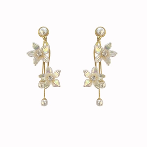 Elegant gold flower tassel earrings with mother of pearl finish and hanging pearls