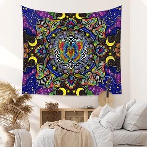 Psychedelic mandala tapestry with mushroom and moon patterns in a bedroom setting