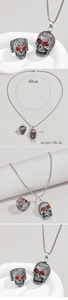 Detailed dimensions for silver skull jewelry set featuring red faceted gemstones