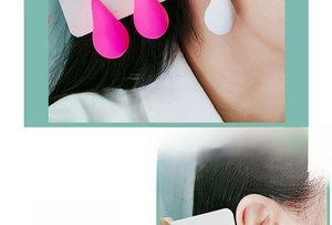 Detail of chunky water drop earrings in matte pink and white acrylic resin finish