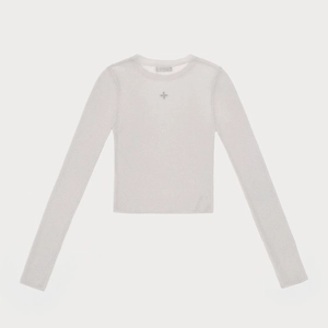 Detail of white slim-fit knit top featuring small cross embroidery and round neckline