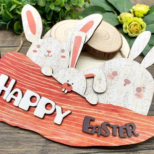 Carrot-shaped wooden Happy Easter sign with two bunnies on a rustic wood background