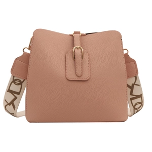 Front view of pink leather bucket bag with litchi texture and wide patterned strap