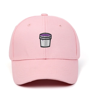 Adjustable pink cotton baseball cap featuring embroidered cup design on front