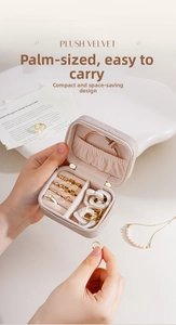 Close-up of plush velvet travel jewelry organizer with zipper and ring slots