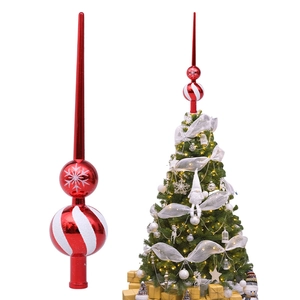 Gourd-shaped Christmas tree topper with red and white snowflake patterns on a tree