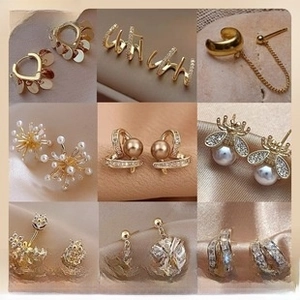 Detail view of 6-piece geometric zircon earring set with black drip glaze and gold finish