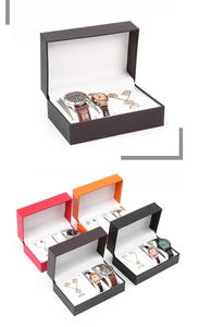 Detailed interior of a premium leather gift box showing slots for watches and jewelry