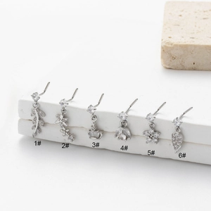 Set of stainless steel nose studs with cubic zirconia pendants in six unique designs