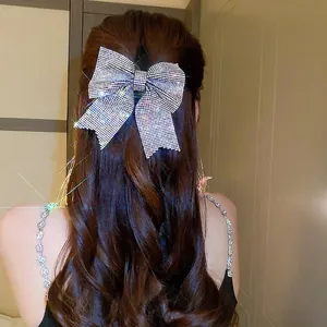 Elegant sparkling full rhinestone bow hair clip on long wavy hair for women