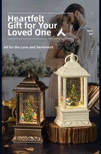 European vintage Christmas lanterns with internal LED light and miniature winter scene