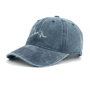 Washed cotton baseball cap featuring dog silhouette and love embroidery in retro blue