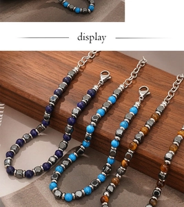 Detail of beaded bracelets with tiger eye, lapis stones and adjustable lobster clasp