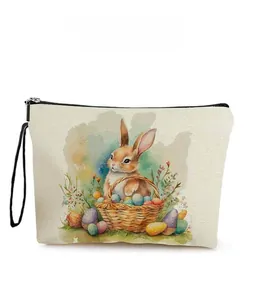 Detail of linen Easter bunny makeup bag featuring vintage watercolor print and black zipper