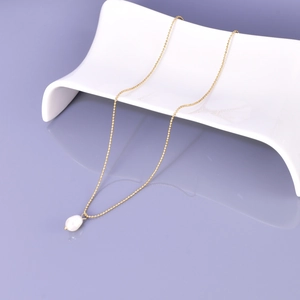Elegant gold chain necklace featuring a white teardrop pearl pendant on a white display