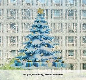 Blue Christmas tree static window decal showing glue-free water-stick application