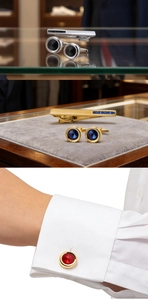 Macro view of crystal cufflinks and tie clips set in silver and gold finishes