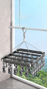 Aluminum alloy drying rack with windproof hook and multi-clips against blue sky