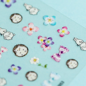 Cute 5D cartoon rabbit and hedgehog nail stickers with matte translucent finish on blue paper