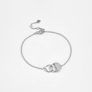 Detail of S925 sterling silver interlocking rings on a delicate chain with clasp
