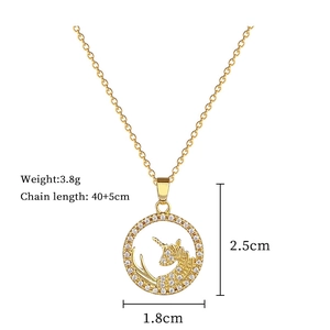 Detail of gold unicorn pendant with measurements showing 1.8x2.5cm and 40cm chain