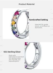 Detail of S925 sterling silver hoop earrings with hand-inlaid rainbow 5A zircons