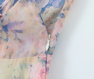Detail of floral printed fabric showing high-quality invisible zipper and stitching