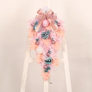 Decorazione natalizia a goccia rosa con palline blu e fiocco in seta elegante