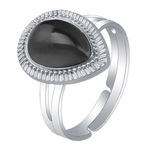 Macro detail of teardrop black gem set in vintage silver adjustable ring band