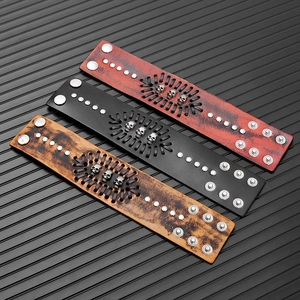 Punk wide leather bracelet set with skulls and metal rivets for men in black, red, and brown