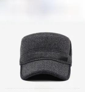Detail view of the sport label and textured wool fabric on this men's winter flat top hat