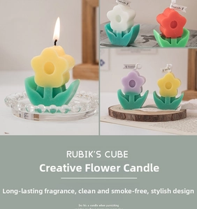 Macro detail of handmade colorful floral scented candles with green leaf bases