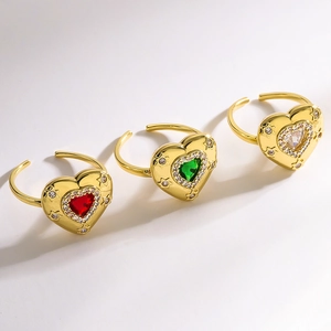 Three 18K gold plated heart-shaped rings with red, green, and white zircon stones