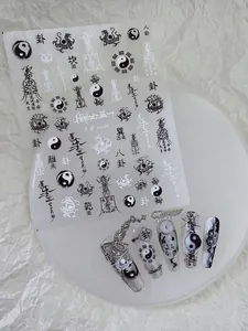 Detail of Yin Yang and Bagua nail art stickers with traditional Chinese Taoist patterns