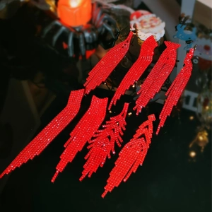 Sparkling red rhinestone long tassel earrings for women in various elegant designs