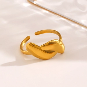 Abstract twisted golden stainless steel open ring with an organic minimalist shape