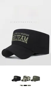 Detailed close-up of the cotton twill fabric and special warfare embroidery on a military cap