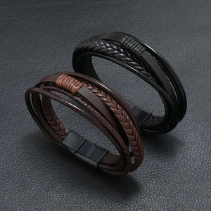 Men's minimalist braided leather bracelets in black and brown with magnetic clasp closures