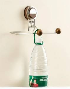Strong load-bearing kitchen roll holder with metal rod and wooden head on wall