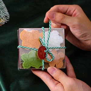 Christmas scented candle gift set with Santa Claus, Snowflake, and Gingerbread Man shapes