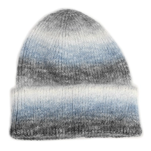 Detailed view of ombre knitted beanie showing thick ribbed texture and gradient colors