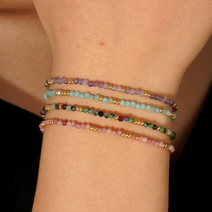 Bohemian style colorful natural stone beaded bracelet set with golden metallic accents